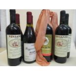 Three bottles of Visanto Colli della Toscana Centrole 1985, three bottles of Huapai Pinot Noir 1991,