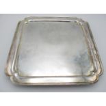 A large George V silver salver by The Goldsmiths & Silversmiths Company, London 1930, of square form