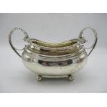 A William IV silver twin handled sugar bowl, London 1829, maker's initially partially rubbed,