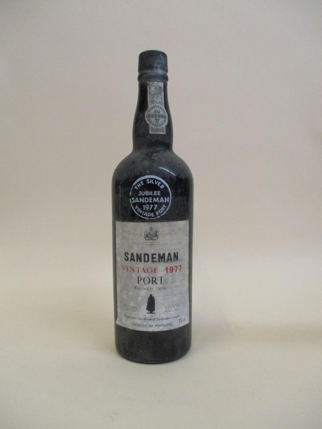 One bottle of Sandeman Vintage Port dated 1977, bottled in 1979, 75cl