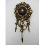 A Victorian yellow metal, enamel, amethyst and pearl brooch, of circular form with pierced yellow