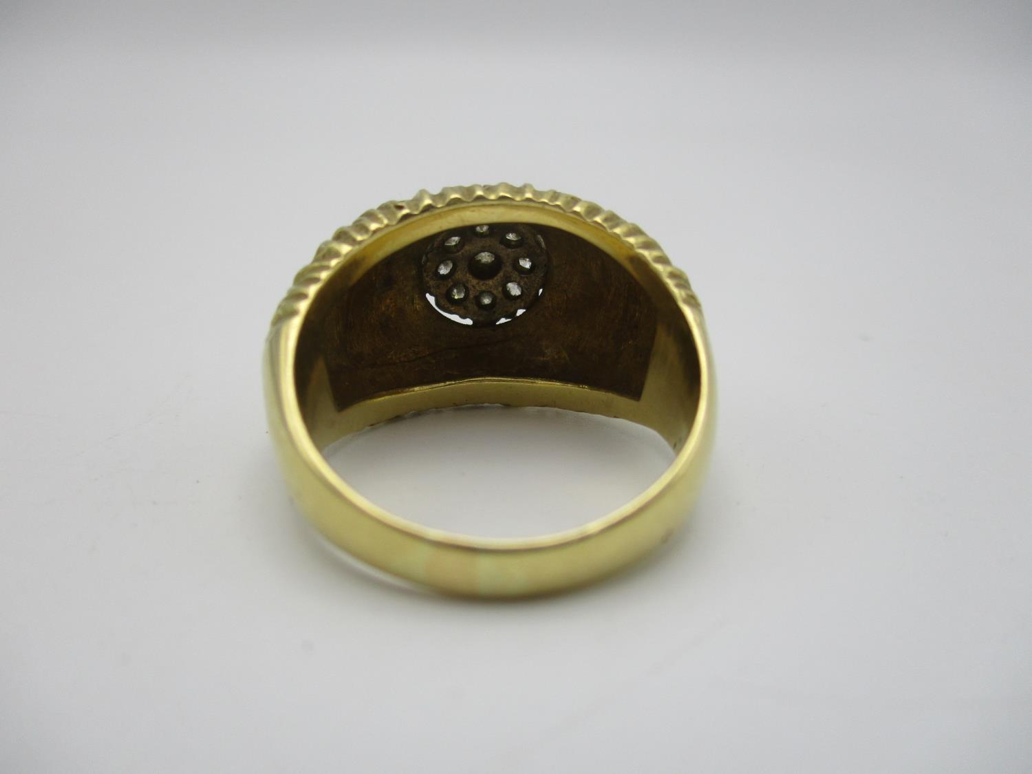 An 18t gold and diamond Modernist style ring, with textured finish, centred with nine cluster - Image 3 of 4