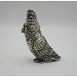 An Edwardian novelty silver pin cushion, modelled as a cockatoo, Birmingham 1905, probably by Levi &