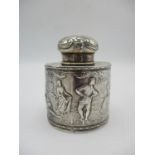 A late Victorian silver tea caddy by B Muller & Son, Chester 1898, of circular form with embossed
