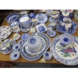 A quantity of blue and white ceramics and similar to include an ironstone triangular cheese dish