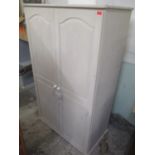 A modern pine painted two door wardrobe 176.5cm h x 104cm w