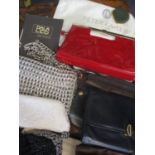 A quantity of ladies late 20th century to modern day hand bags, shoulder and clutch bags to