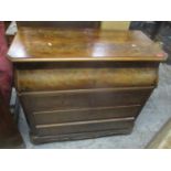 A Victorian walnut three drawer chest having a lift-up top revealing a mirror 87cm h x 100.5cm w