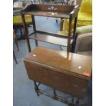 A low oak open bookcase together with a small mahogany drop leaf occasional table