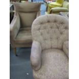 A Georgian camel back, deep seated armchair in a brown velour fabric above mahogany tapering legs