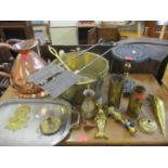 A French biscuit mould and other items of metalware to include a large copper jug and brass shell