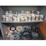 A selection of early 20th and later commemorative mugs, cups and saucers, plates and dishes to