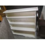 A white painted four shelf waterfall open bookcase and an oak two tier tea trolley with single