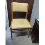 A set of five retro lightwood dining chairs with ladder backs and upholstered seats and a matched