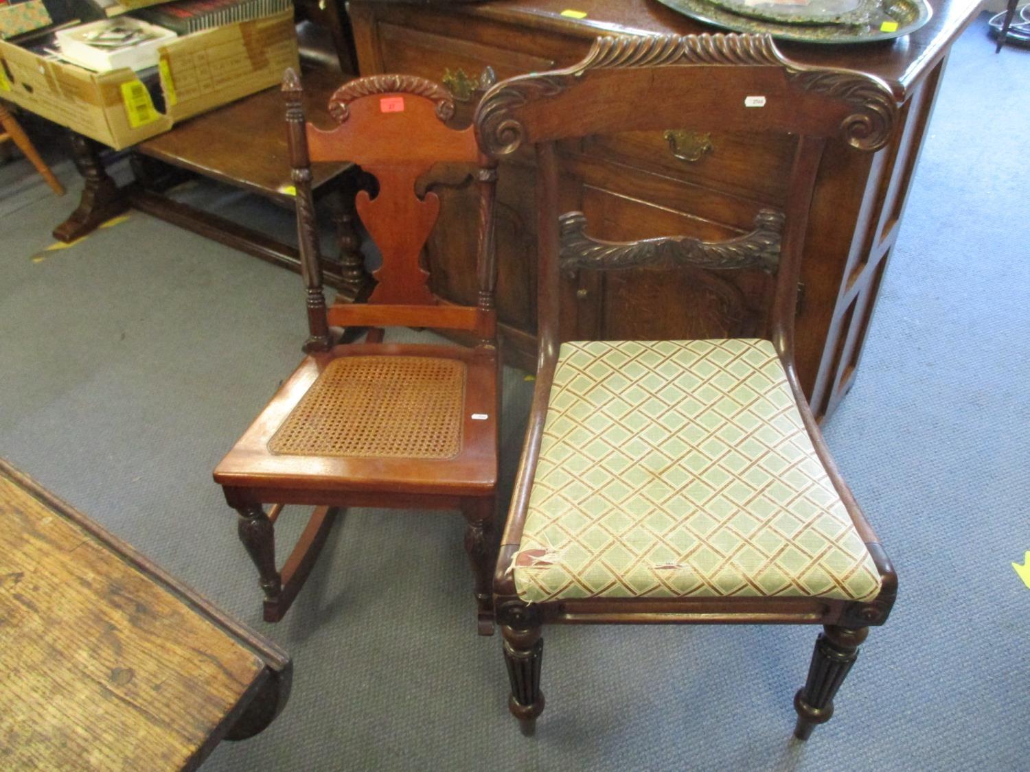 A Victorian mahogany cane seated rocking chair with pineapple finials, and a William IV rosewood bar