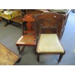 A Victorian mahogany cane seated rocking chair with pineapple finials, and a William IV rosewood bar