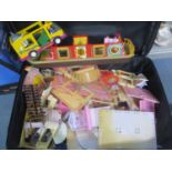 A mixed lot of toys to include a troll doll, dolls house furniture, Little Tikes and other items