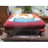 An early 20th century mahogany upholstered foot stool, the top with tapestry cover depicting a