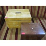 A stripped pine box with central plaque together with a mahogany jewellery/sewing box (locked and