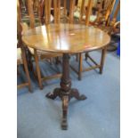 A Victorian mahogany pedestal occasional table, circular top, supported on turned and tapering
