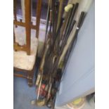 Four vintage croquet mallets with hoops and markers, three Henry Cotton golf clubs, six G M