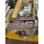 A 1950's Singer 201k sewing machine in brown, housed in a reptile style travelling case together