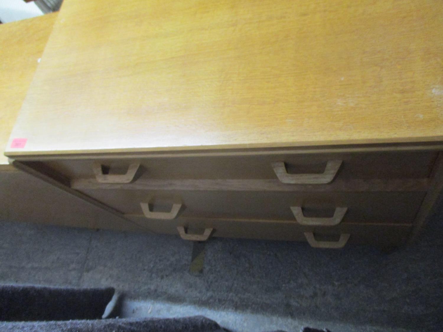 A mid century chest of three graduated drawers, a teak chest of four drawers with round gilt metal - Image 2 of 4