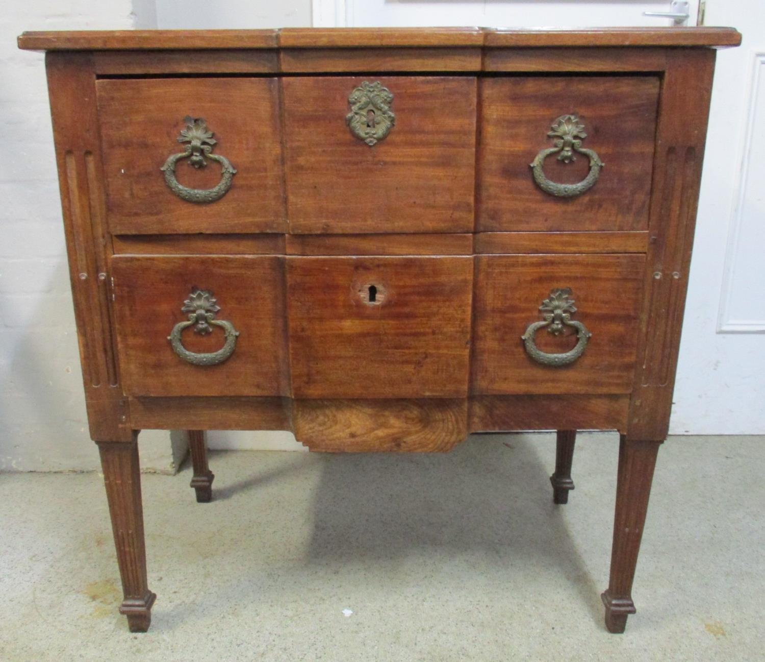 An early 20th century French transitional style commode, of small proportion, with two horizontal