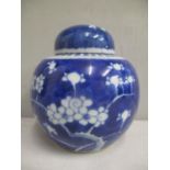 An early 20th century Chinese blue and white ginger jar and cover