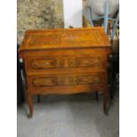 A reproduction of an Italian style bureau with marquetry ornament, a full flap with fitted