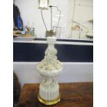 A pottery table lamp decorated with encrusted flower heads on gilt wood base, 59cm h with base (