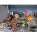Two Millie Fleurie glass paperweights and others to include a Caithness Moon crystal example and a
