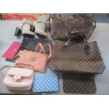 A selection of hand bags to include some in the style of well known fashion houses together with a