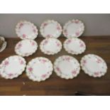 A set of ten Royal Crown Derby Royal Pinxton Roses pattern plates