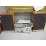 A JVC JA-511 stereo integrated amplifier, a Realistic STA-730 AM/FM stereo receiver, and a pair of