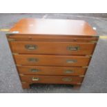 A 20th century Campaign style mahogany chest with four drawers and a slide, on bracket feet, 64 h x