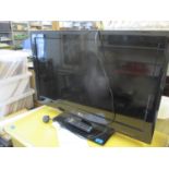 An LG LED TV 31" with remote and owners manual