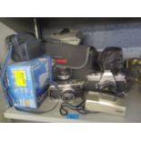 Mixed cameras to include a Minolta SRT 101