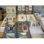 A quantity of Edwardian and later postcards mounted in five albums to include an album of actress'