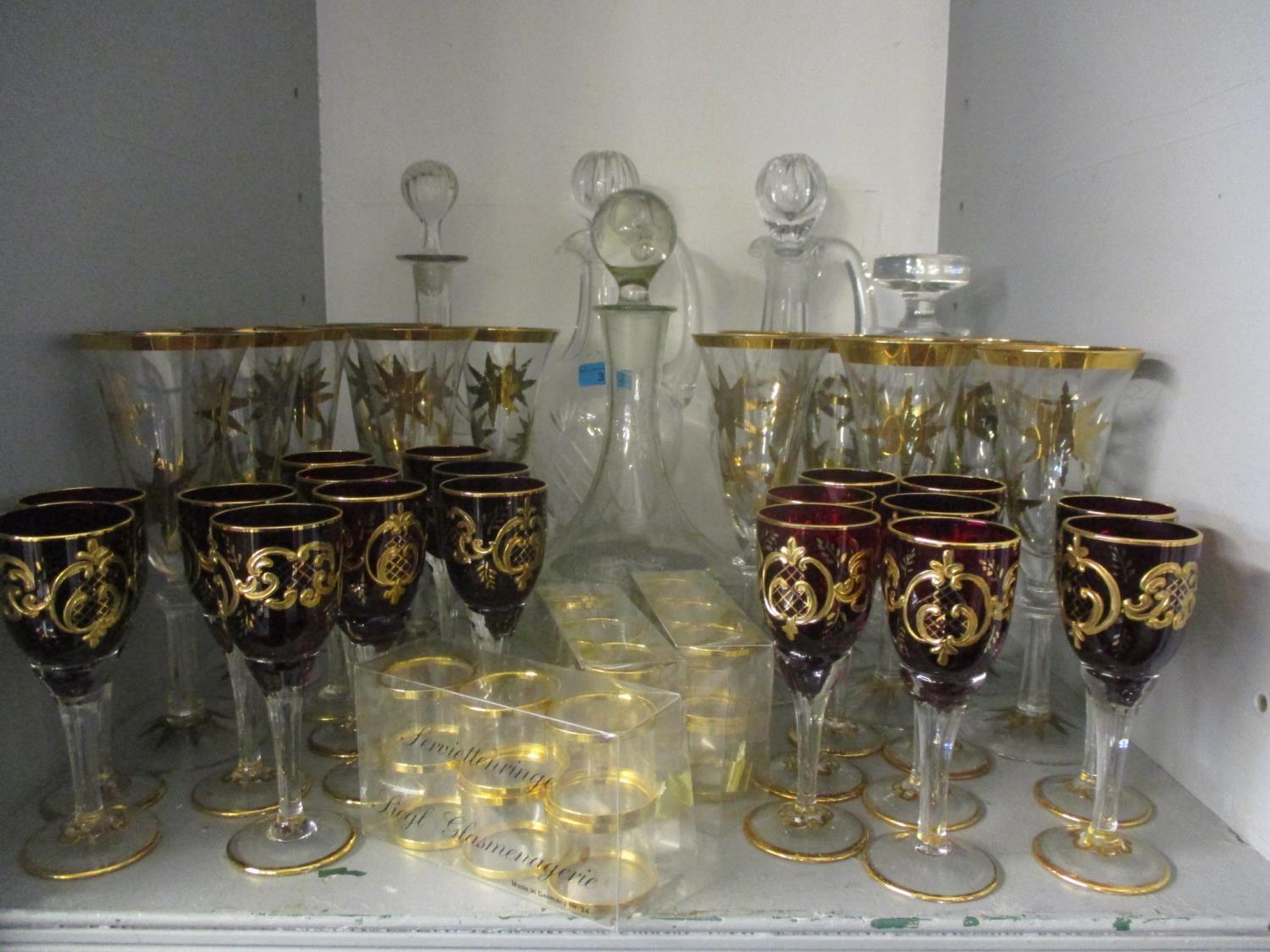 Five glass decanters with five stoppers to include two claret jug decanters, a set of eighteen - Image 4 of 4