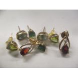 Mixed 9ct gold earrings to include peridot earrings and others total weight 4.3g