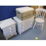 A modern pine chest of three long drawers, a matching bedside chest and a kitchen chair, all painted