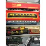 Hornby Railways silver seal locomotive, a Triang Davy Crockett engine, mixed carriages, rolling