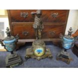 A French mantle clock with spelter figure of a young scholar above together with a pair of cloisonné