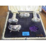 A four piece silver cruet part set, box A/F, 244g