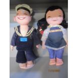 Two 1986 Michael Lee dolls, Star Ferry and Hakka woman, signed on the foot and one metal stand