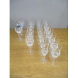 A part suite of Galway cut crystal drinking glasses circa 1970, to include Champagne flutes, large