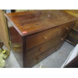 A Victorian altered chest of two short and two long drawers having bun shaped handles and on castors
