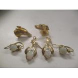 Two 9ct gold earrings fashioned as Greyhound heads together with four 9ct gold opal set earrings,