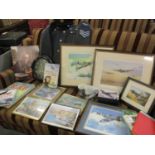 A collection of RAF memorabilia and assorted items to include prints, a wall clock, books, mugs
